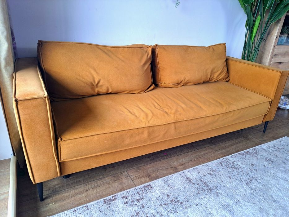Musztardowa sofa terra z funkcją spania I pojemnikiem na posciel