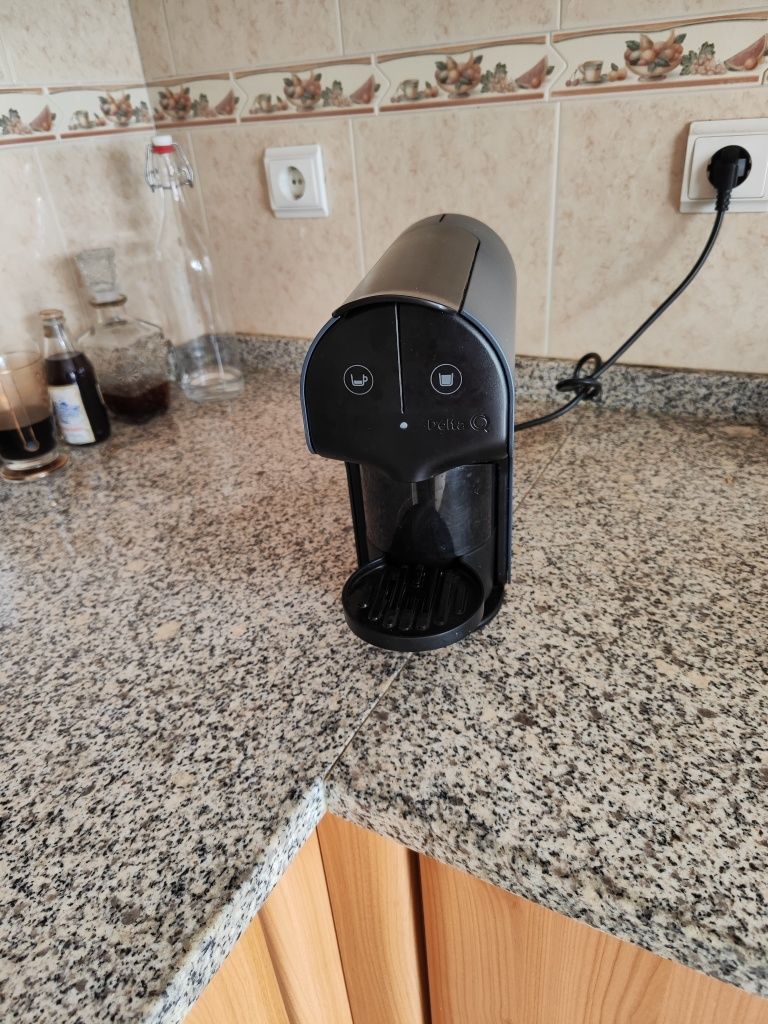 Máquina de café delta q