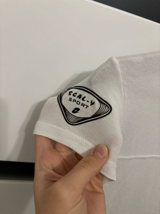 Biała bluzka sportowa polo