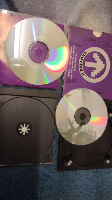 2 gry na Amigę 32cd igła