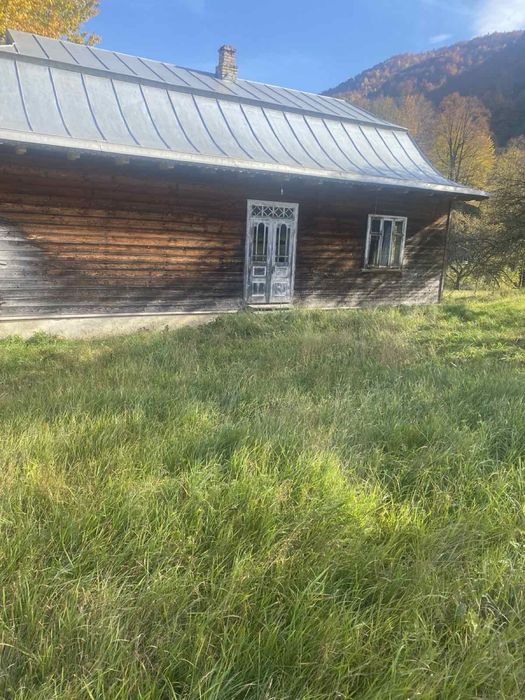 Будинок, гори, річка