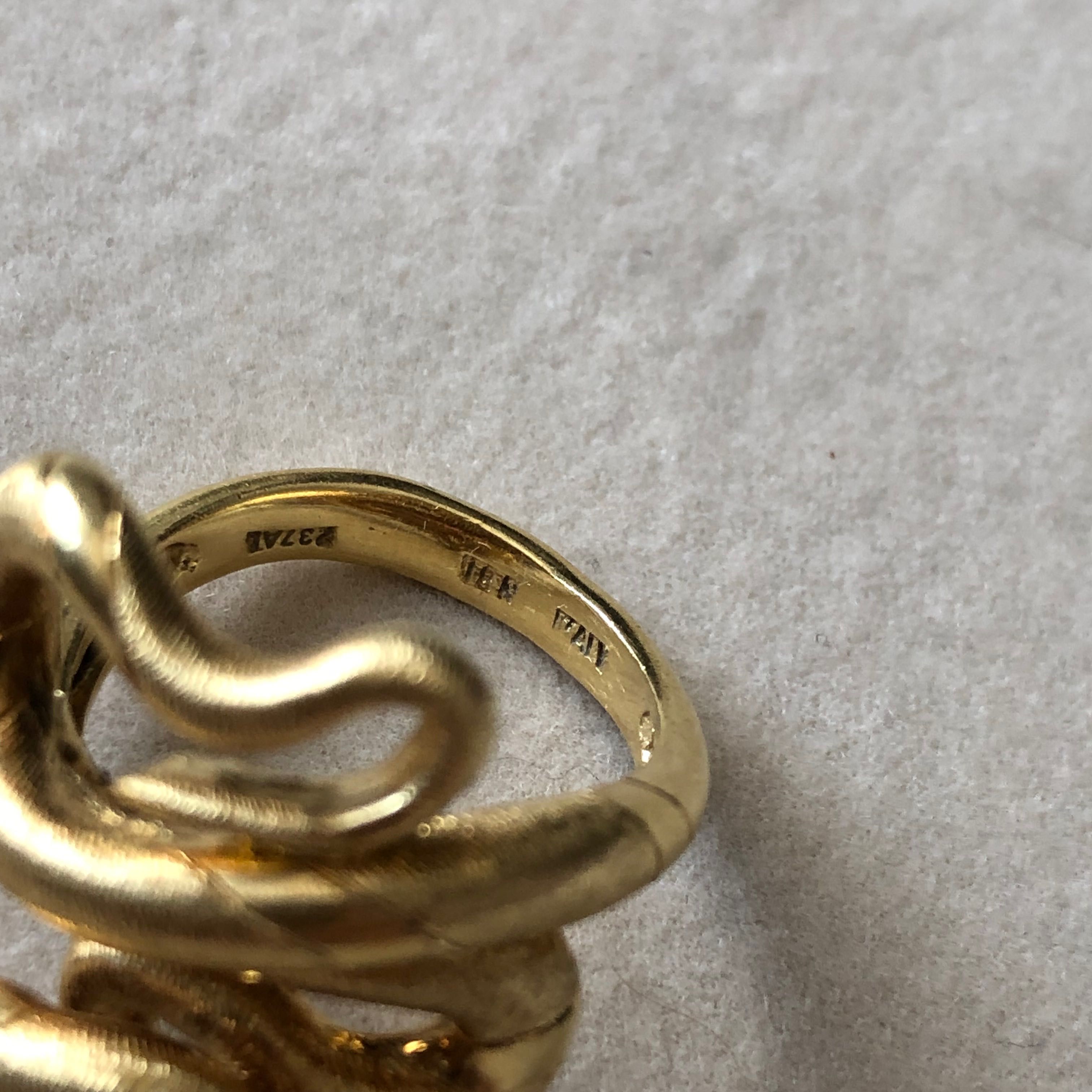 Włoski pierścionek wąż z 18k złota.