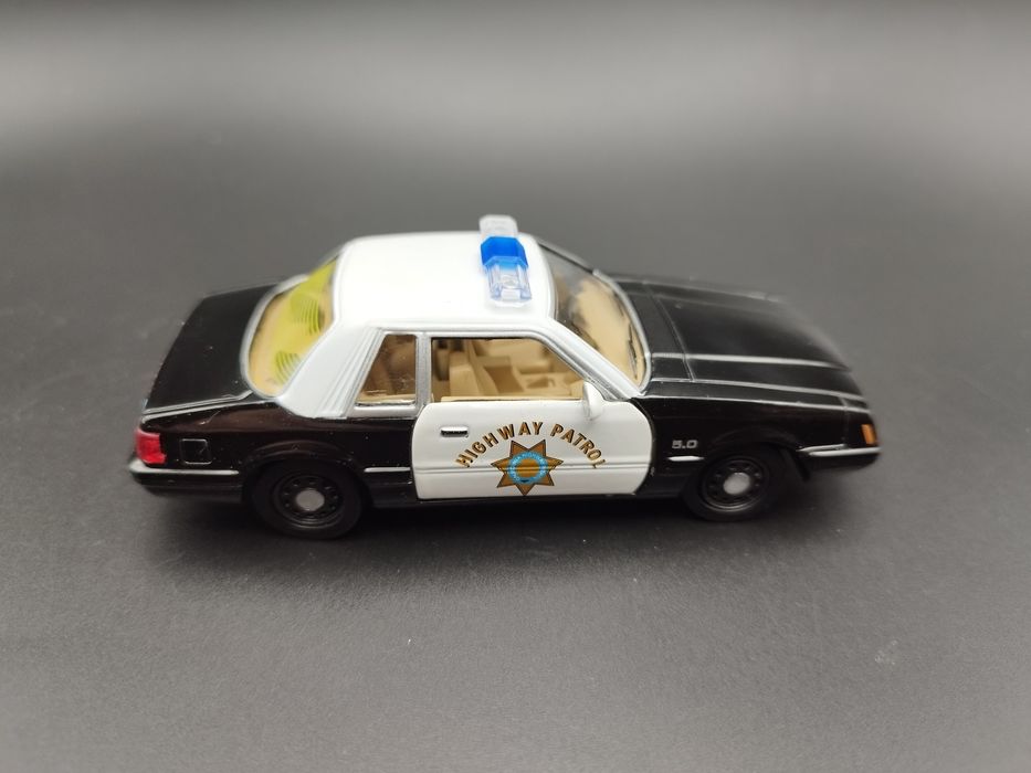 1:43 AmerCom 1985 Ford Mustang California Highway Patrol USA model