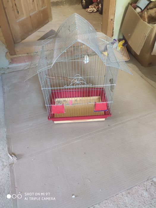 Клітка для папуги