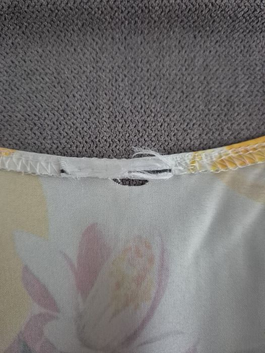 Przepiękny letni kombinezon ala sukienka z przekładanym dekoltem