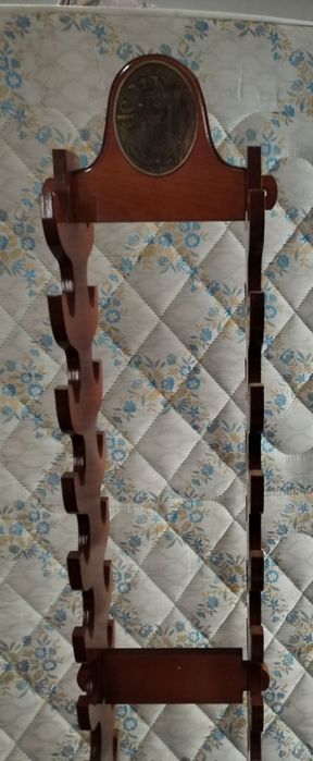 Expositor de pistolas ou espadas