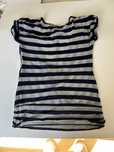T-shirt decotada nas costas.