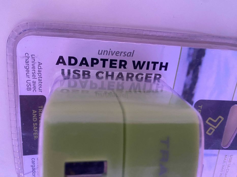 Adaptador universal com carregador USB