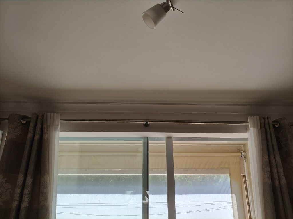Varão de cortinados extensível
