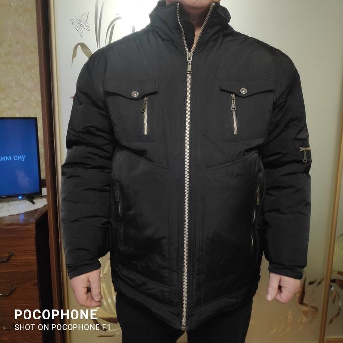 Куртка тепла зимня.