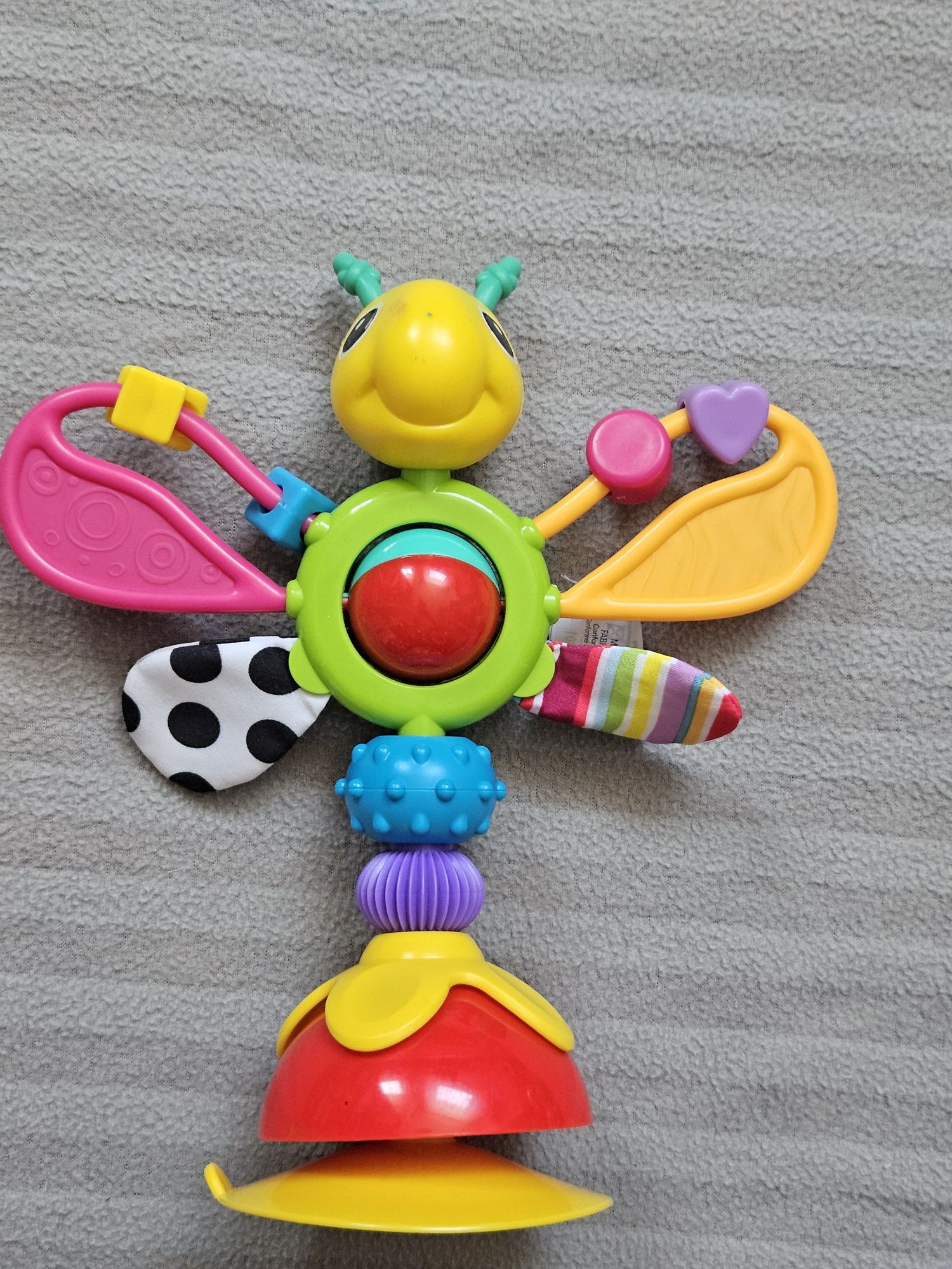 Motyl Lamaze na przyssawce do stolika