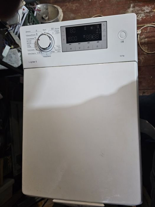 Вертикальная стиральная машина Bosch