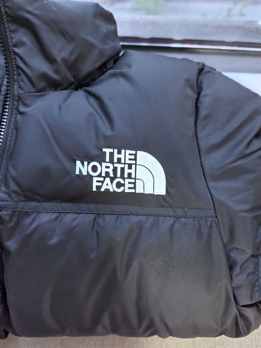 Czarny uniwersalny kurtka puchowa – modna i ciepła!