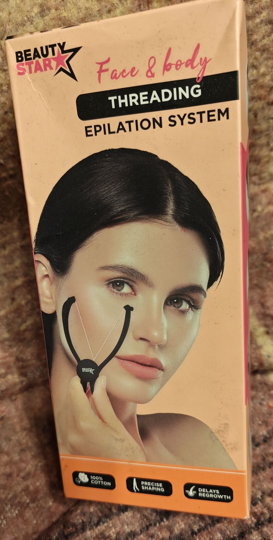Depilator nitkowy