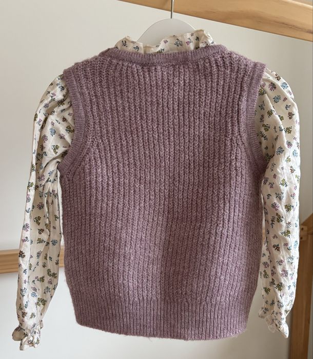 Colete com mangas de blusa