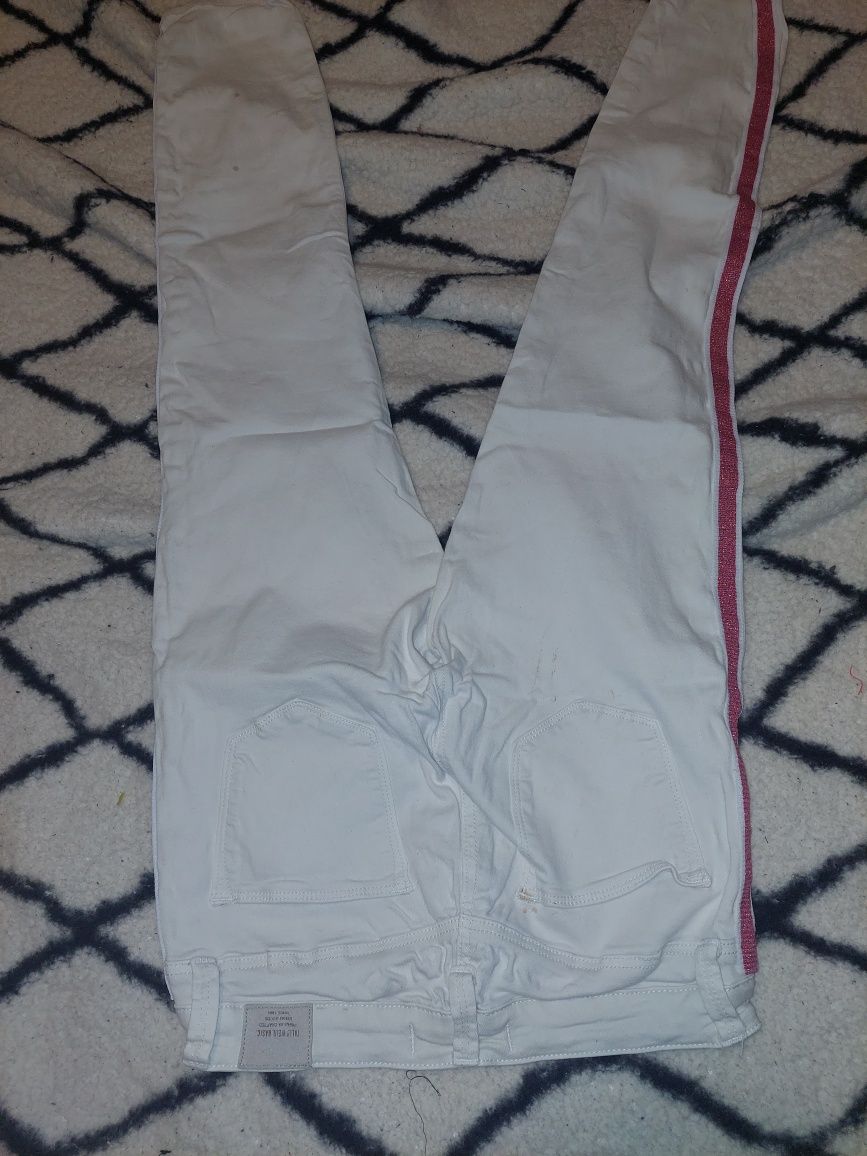 Białe spodnie jeans rozm 38
