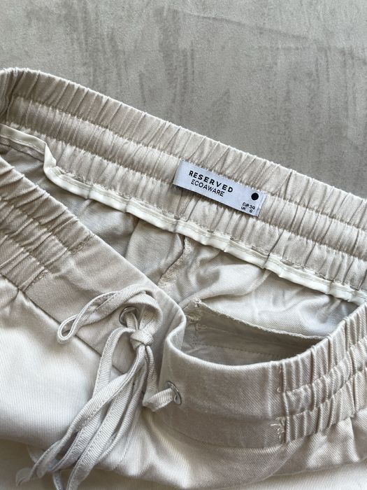 Spodnie klasyczne beżowe chinosy proste z wysokim stanem