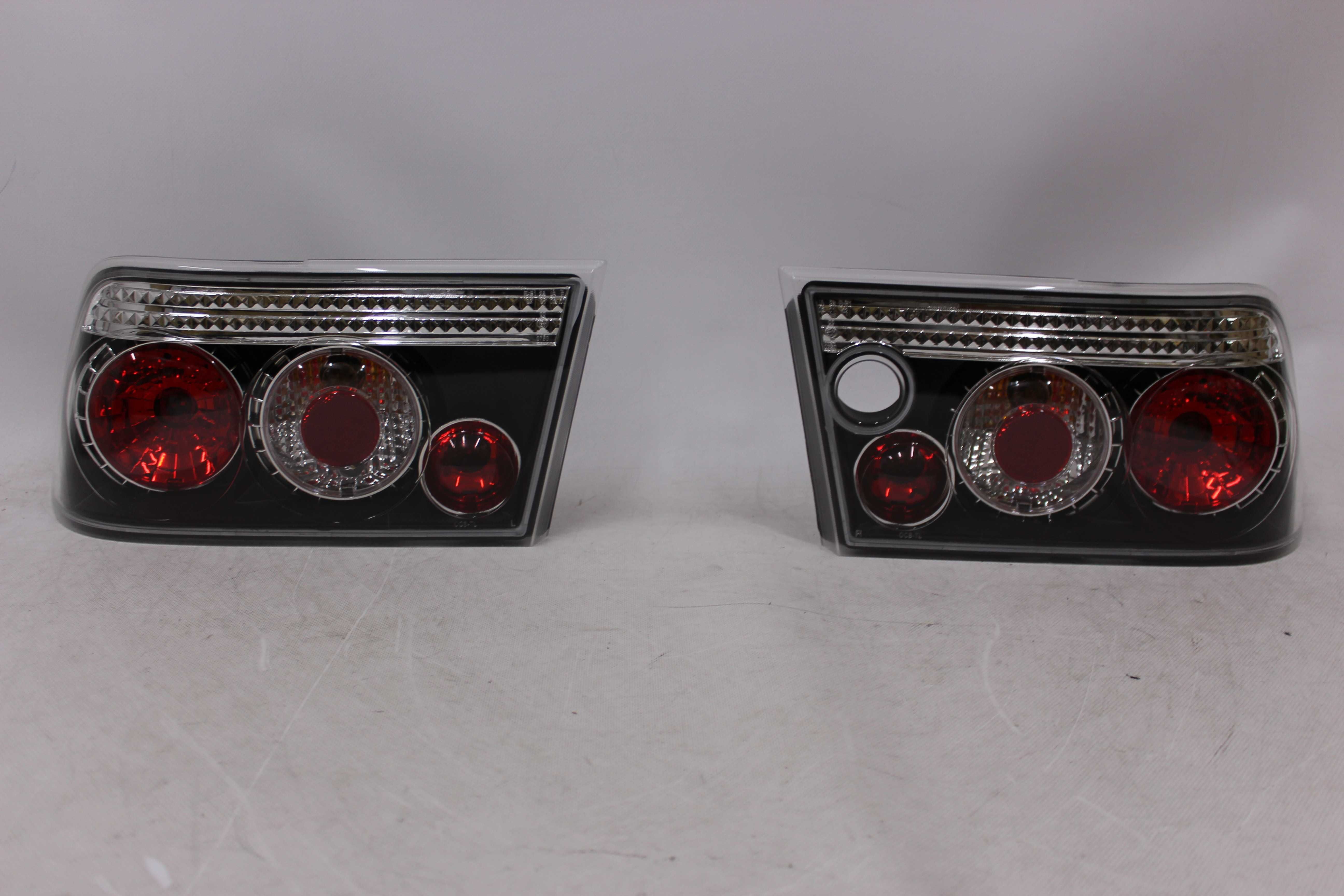 Lampy światła tył tylne OPEL CALIBRA 90-97 BLACK Czarne Smoke NOWE