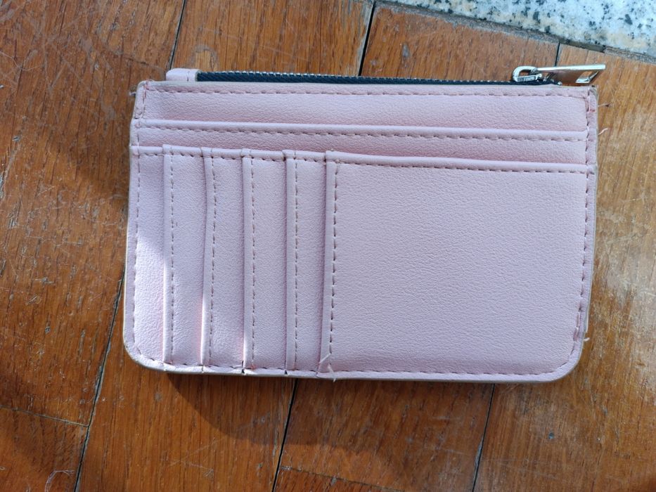 Carteiras como novas