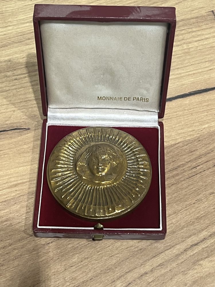 Medal stary.
