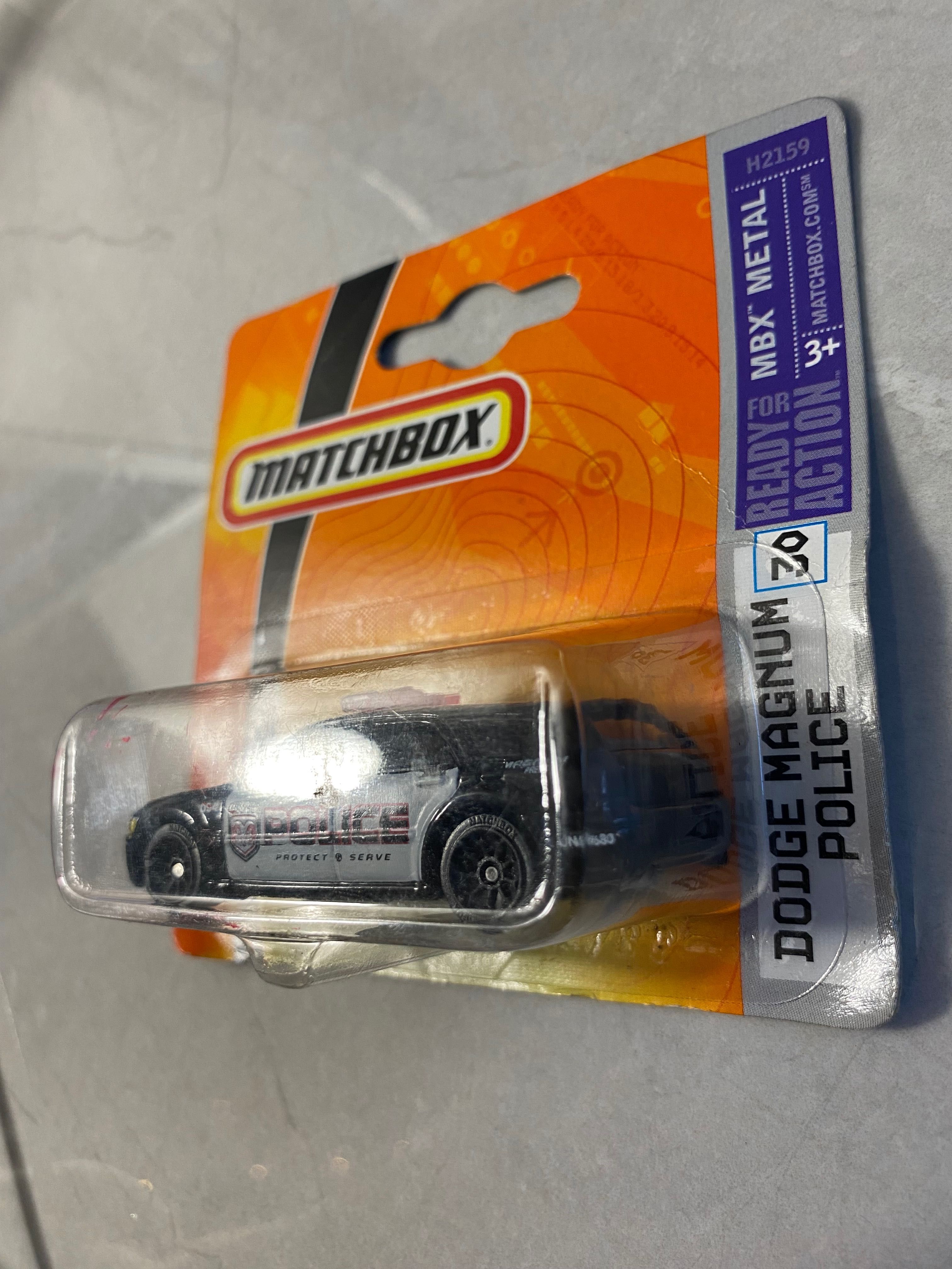 Matchbox Dodge Magnum Police policyjny krótka karta