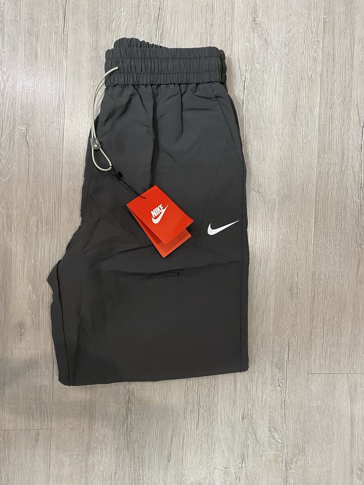 Штани плащові від Nike