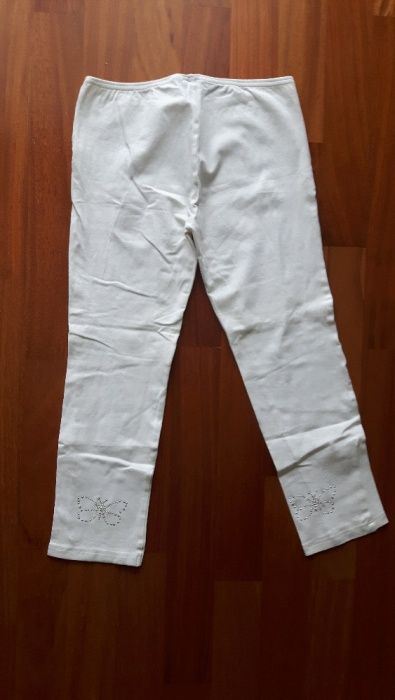 Białe legginsy KappAhl