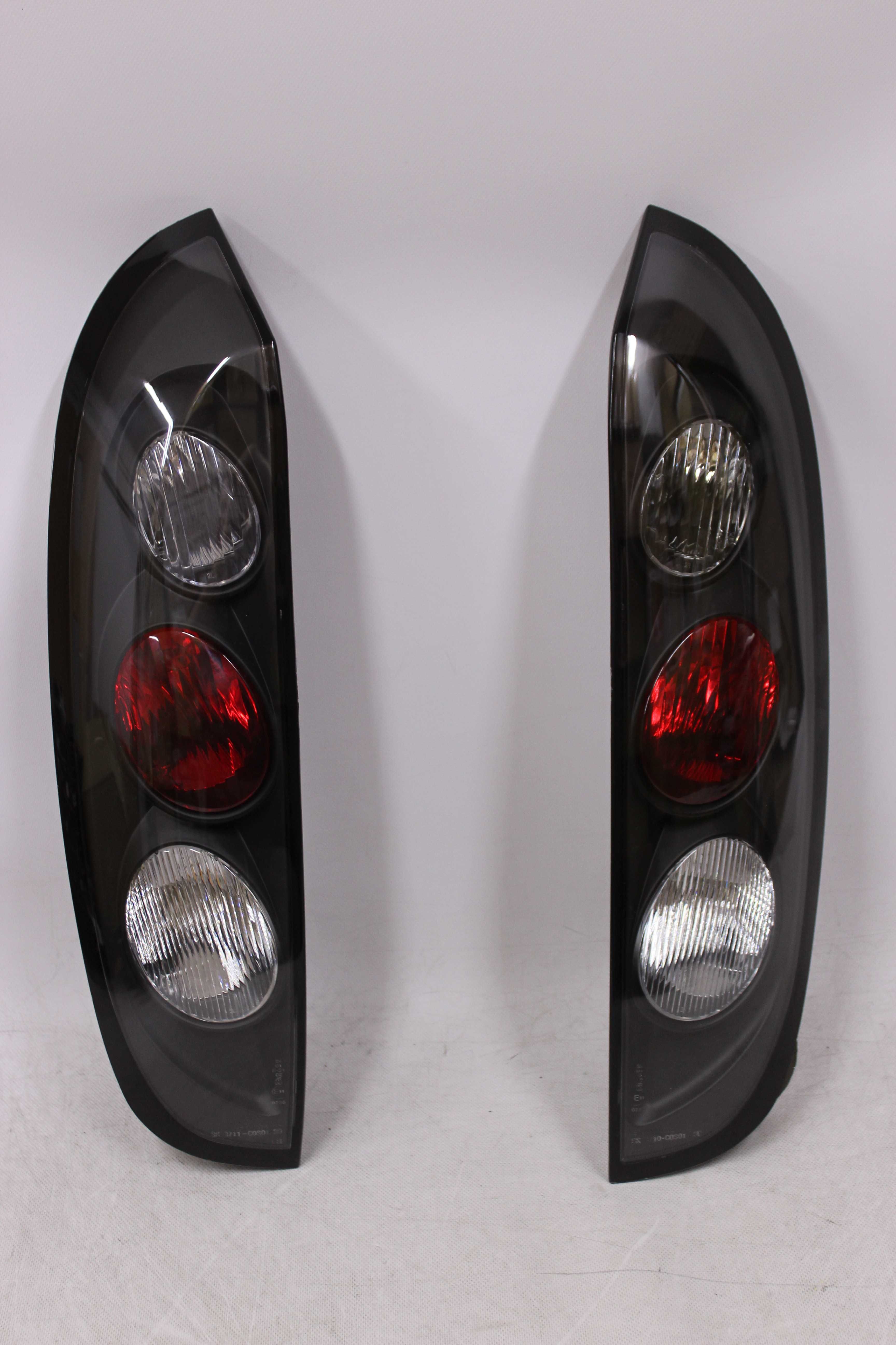 Lampy światła tył tylne OPEL CORSA C III 00-06 TUNING Black SMOKE NOWE