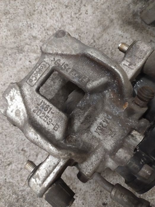 Zacisk hamulcowy tył Ford Focus MK4 Kombi