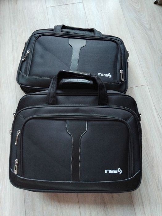 czarne torby na laptopa i dokumenty stan idealny