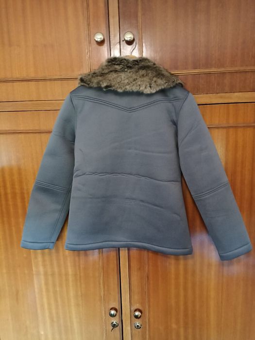 Casaco com gola de pelo