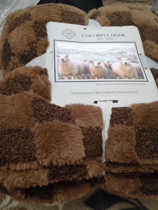 Теплі пледи на штучний овчині