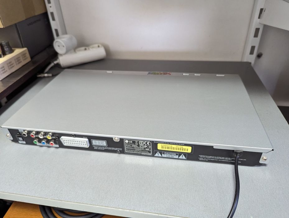 В отличном состоянии DVD Player LG DGK589X. Полный комплект!