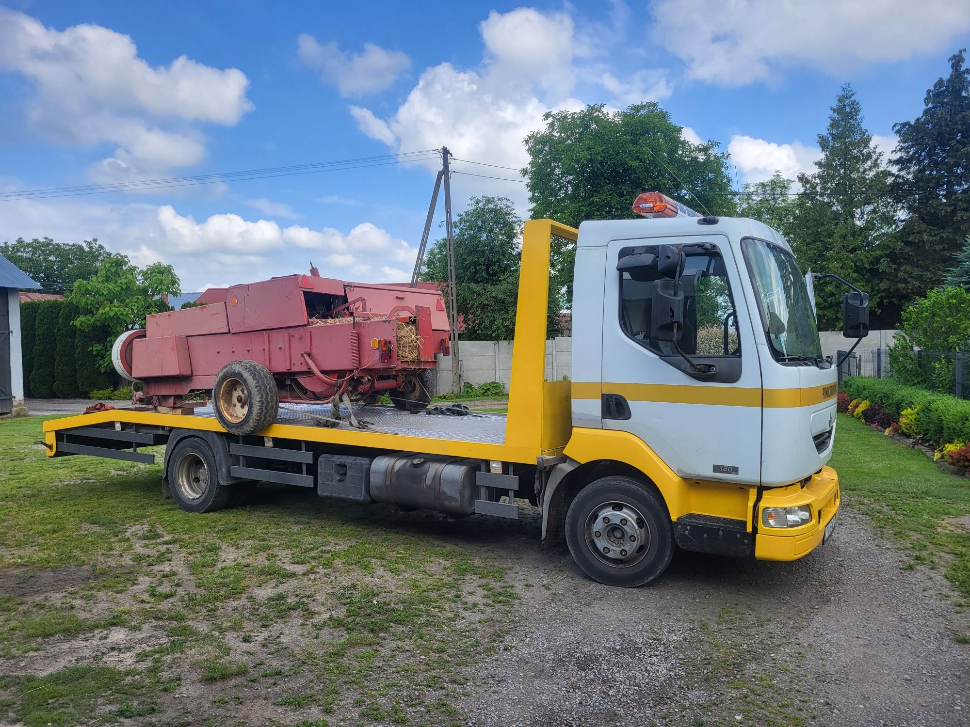 Transport maszyn budowlanych i rolniczych Autolaweta Pomoc Drogowa