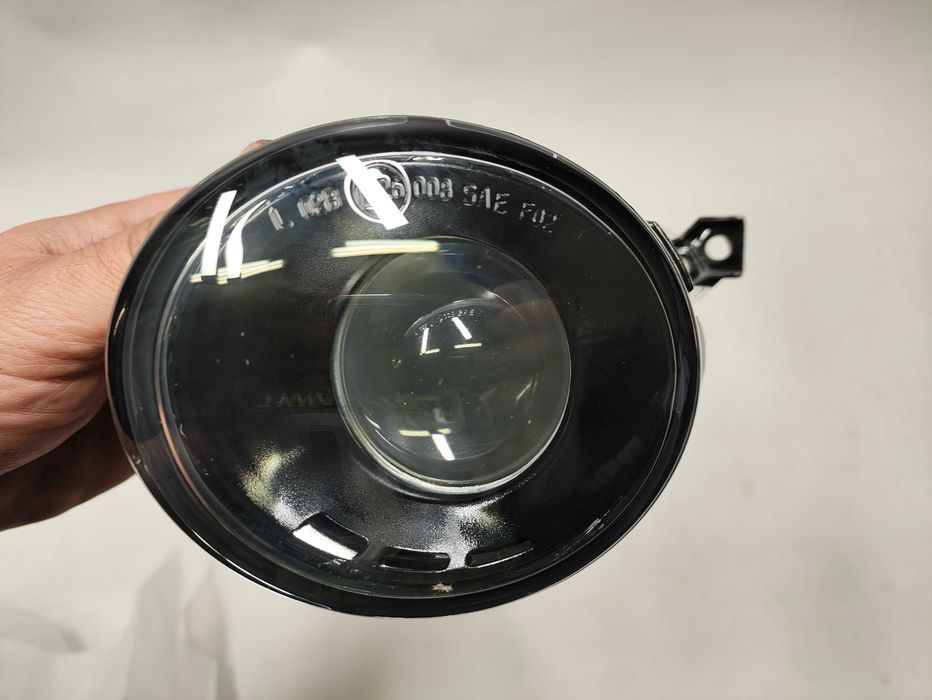Halogen lewy lampa przeciwmgielna lewa VW Touran Caddy NOWA OE