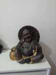 Estatueta Buda em bronze e tons dourados