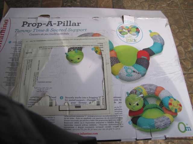 Poduszka podtrzymująca dla noworodków i dzieci z zabawkami