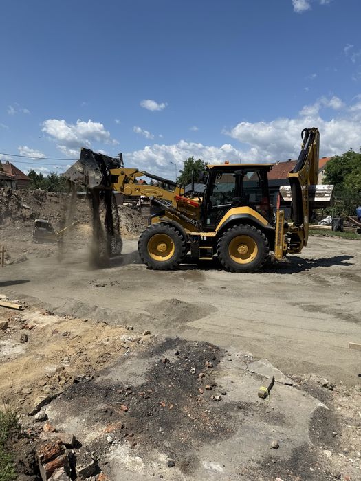 Usługi koparko ładowarką cat 444,prace ziemne,niwelacje,wyburzenia
