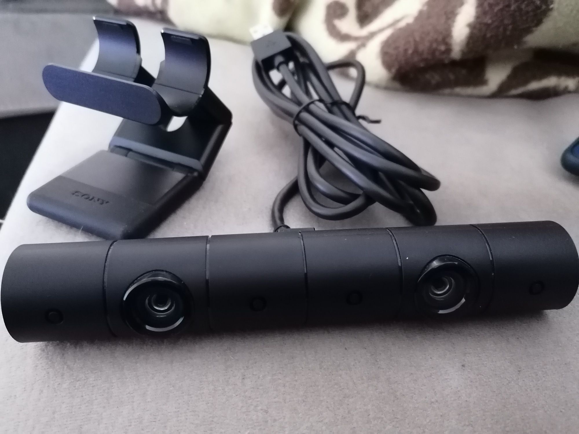 Câmara e auscultadores para ps4 como novos