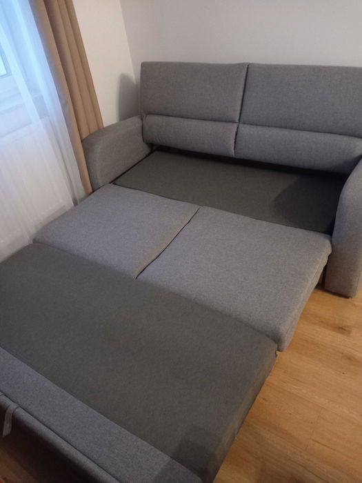 Nowa kanapa rozkładana szara z pojemnikiem na pościel Polecam