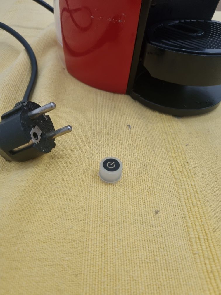 Máquina de café para arranjo problema no Botão