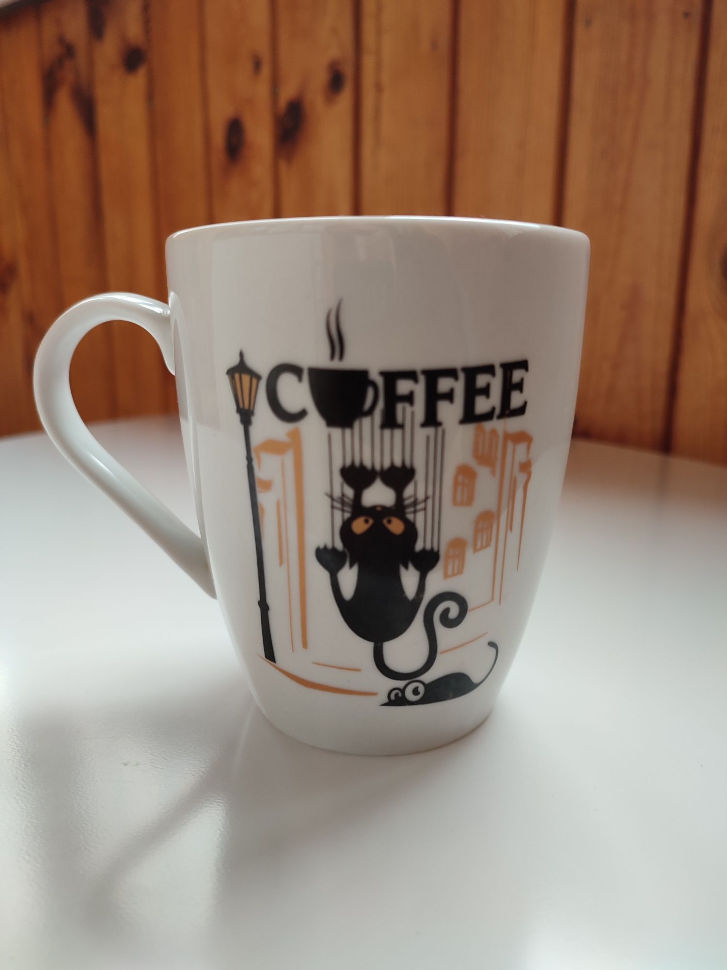 Керамічна чашка з котом