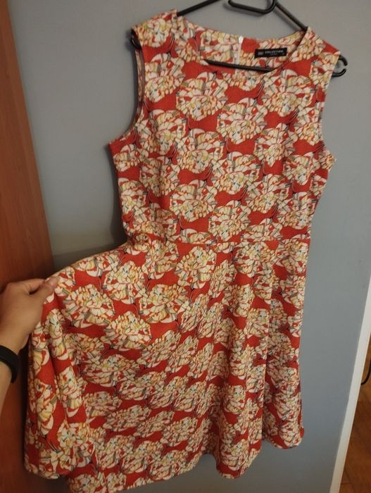 Rozkloszowana sukienka pomarańczowa wzory wzorki collection London 44