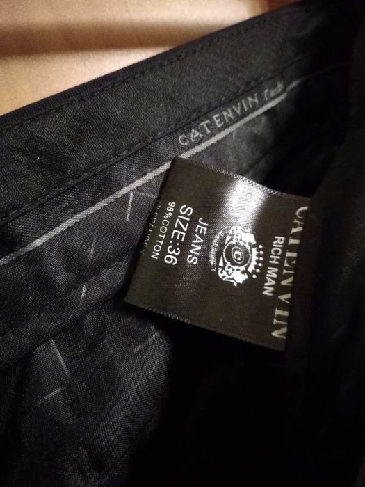 Eleganckie spodnie męskie 36/34