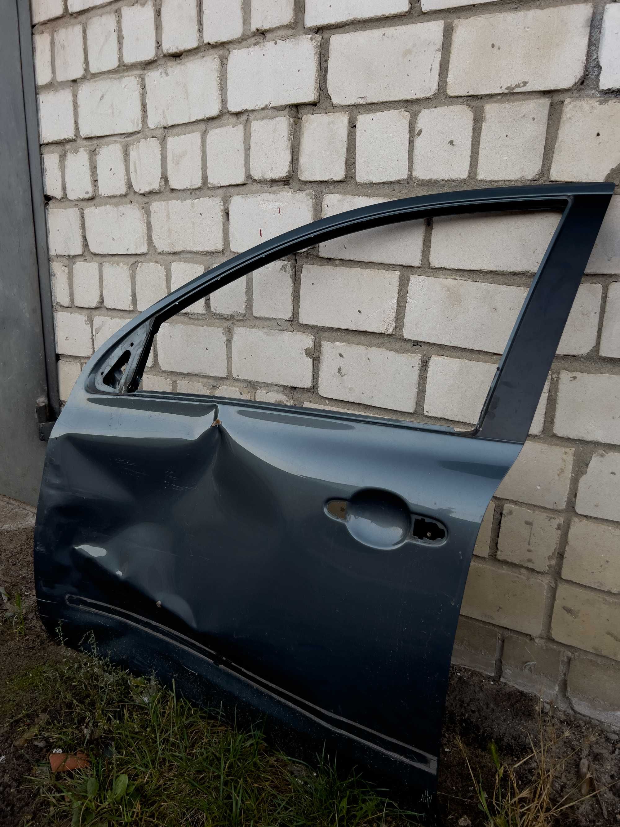Дверка ліва Nissan Micra K13