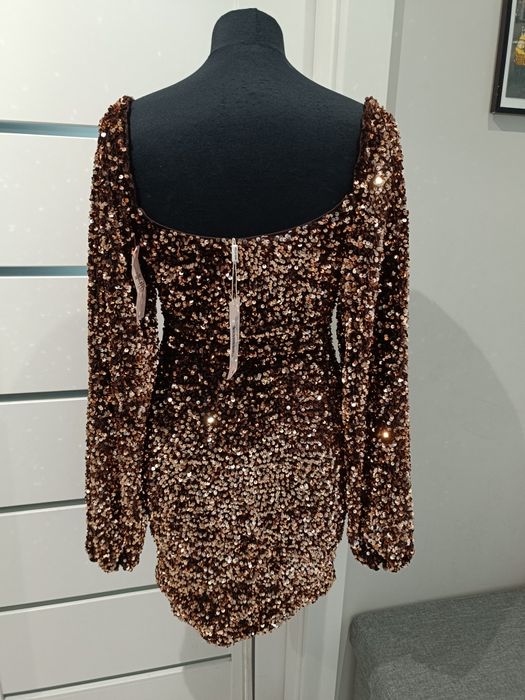 Cekinowa,elegancka sukienka o dużej objętości Nelly,rozmiar 36,impreza