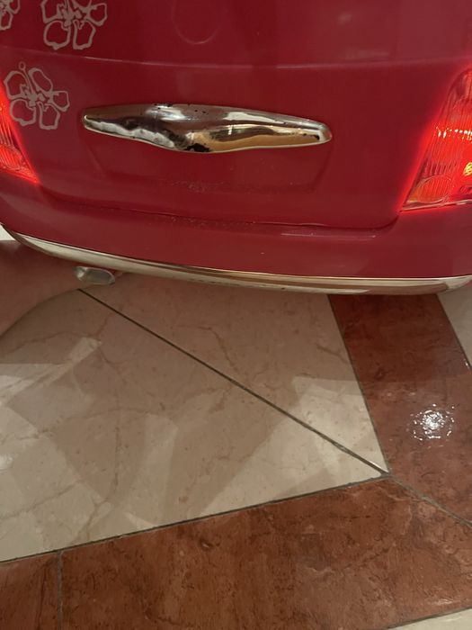 Carro de crianca andar na rua Fiat 500