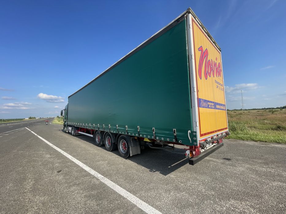 Тягач Man TGX 18.440 MEGA + напівпричіп штора Kassbohrer осі SAF