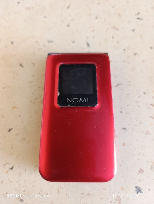 Телефон Nomi     .