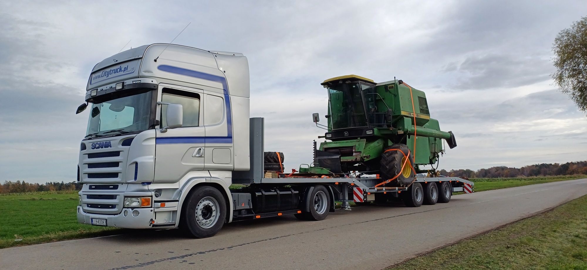 TRANSPORT kombajnów Niskopodwozie Gabarytowy  Laweta